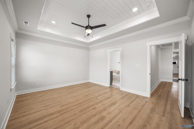 21837 Natures Cove Dr, Athens, AL 35613 - empty room with a raised ceiling, light wood-style floors, ceiling fan, crown molding, and baseboards