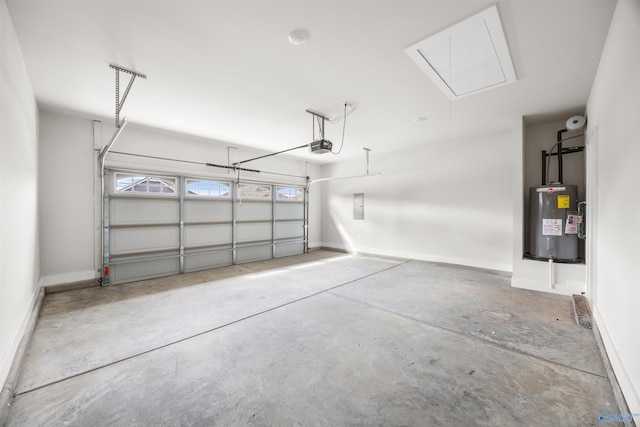 garage featuring water heater and a garage door opener