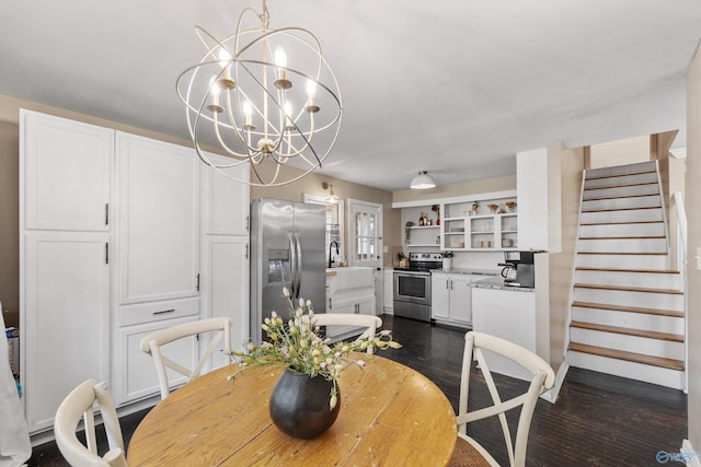 dining room featuring a chandelier and dark hardwood / wood-style flooring