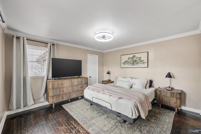 bedroom with crown molding and dark wood-type flooring