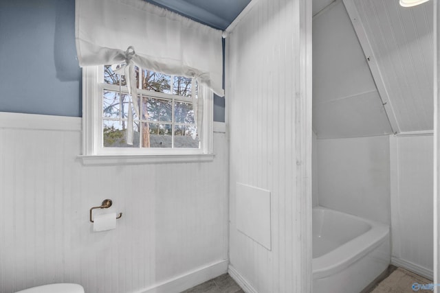 bathroom featuring a tub