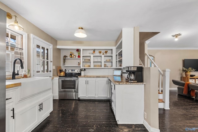 kitchen with light stone countertops, stainless steel electric stove, crown molding, sink, and white cabinetry