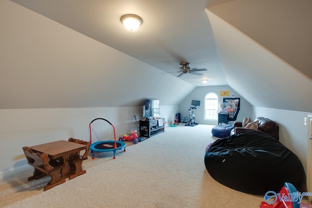 rec room featuring vaulted ceiling and carpet