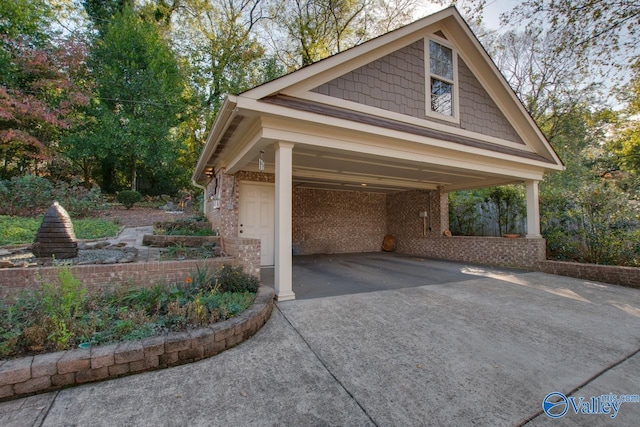 view of side of home featuring a carport