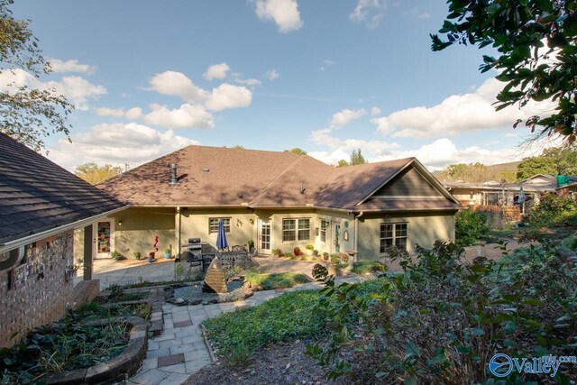 rear view of house with a patio area