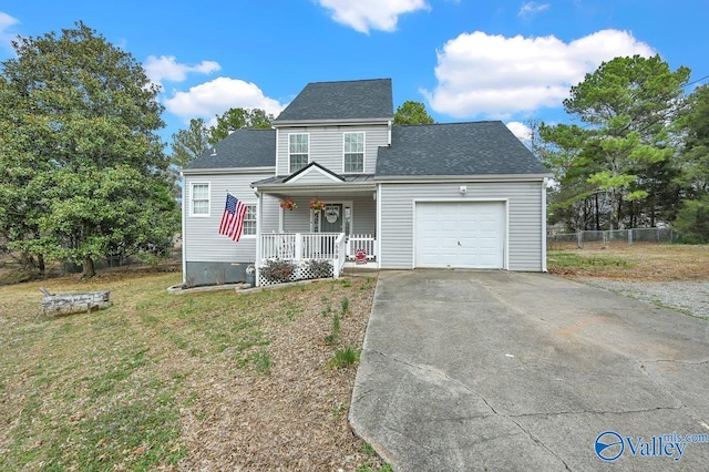 899 Pine Grove Rd, Harvest, AL 35749 - view of front of home featuring a porch, a garage, fence, concrete driveway, and a front yard