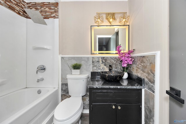 1007 Honeysuckle Ln SW, Decatur, AL 35601 - bathroom with vanity, toilet, and washtub / shower combination