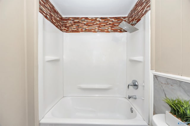 1007 Honeysuckle Ln SW, Decatur, AL 35601 - bathroom featuring toilet and shower / tub combination