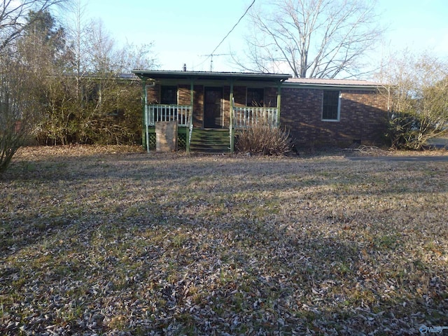 ranch-style house with a porch