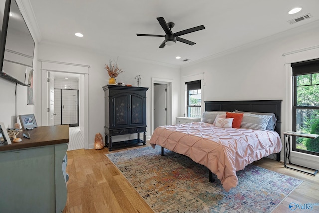 24673 Beacon Cir, Athens, AL 35613 - bedroom featuring light wood-style floors, ornamental molding, recessed lighting, and ceiling fan