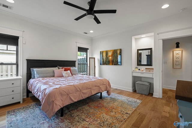 24673 Beacon Cir, Athens, AL 35613 - bedroom featuring ornamental molding, wood finished floors, baseboards, recessed lighting, and a ceiling fan