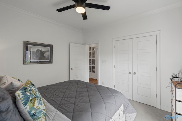 24673 Beacon Cir, Athens, AL 35613 - carpeted bedroom featuring crown molding, a closet, and a ceiling fan