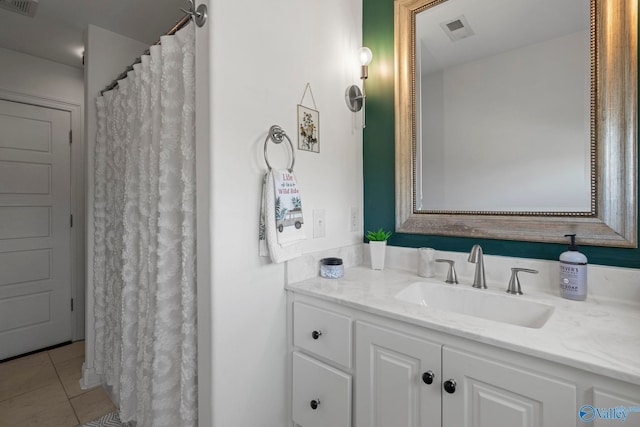 24673 Beacon Cir, Athens, AL 35613 - bathroom featuring vanity and tile patterned floors