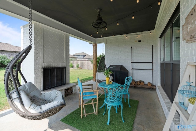 24673 Beacon Cir, Athens, AL 35613 - view of patio with an outdoor brick fireplace and area for grilling