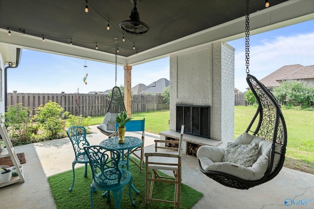 24673 Beacon Cir, Athens, AL 35613 - view of patio featuring an outdoor living space with a fireplace