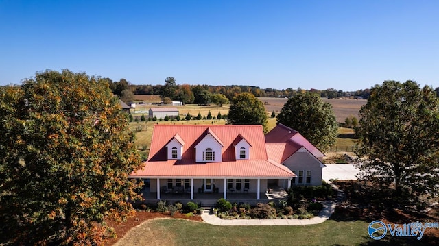 birds eye view of property with a rural view