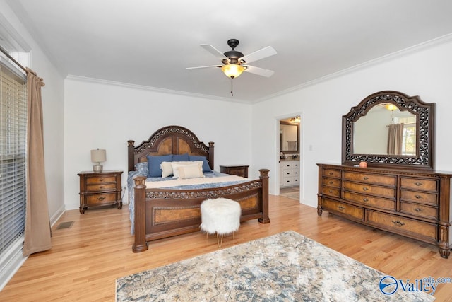 bedroom with light hardwood / wood-style floors, ornamental molding, and ceiling fan