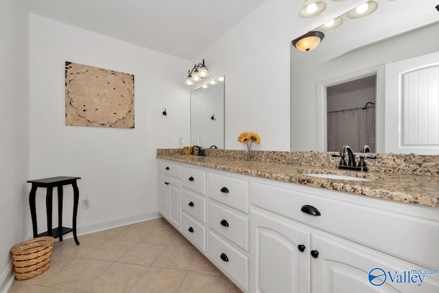 bathroom with vanity, tile patterned flooring, and a shower with shower curtain