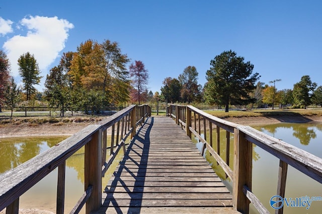 view of dock with a water view