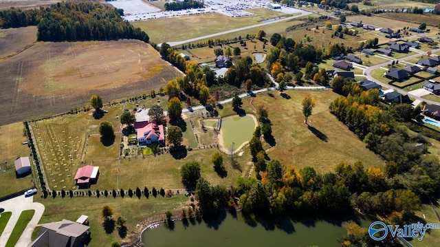 aerial view featuring a water view and a rural view