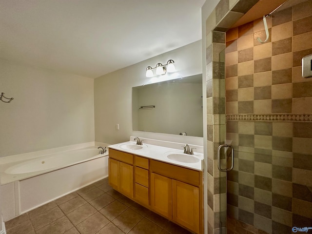 bathroom with tile patterned flooring, vanity, and plus walk in shower