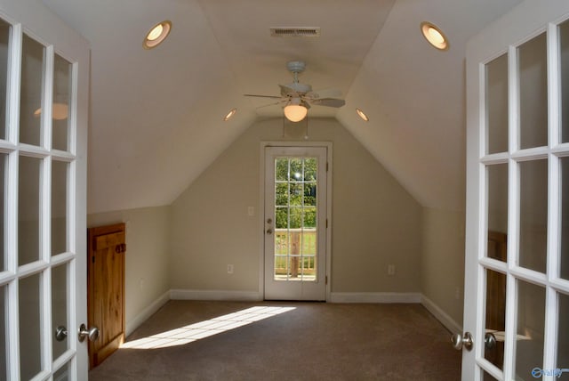 bonus room with lofted ceiling, carpet floors, and ceiling fan