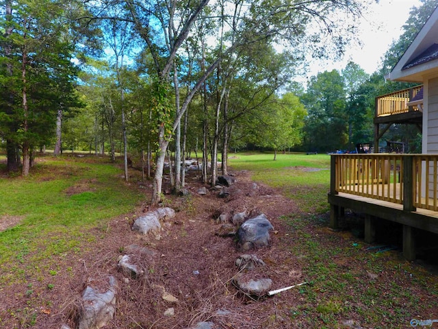 view of yard featuring a deck