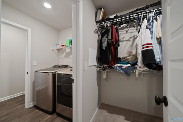 laundry room featuring hardwood / wood-style flooring and separate washer and dryer