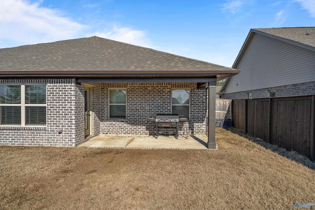 back of property with a patio area