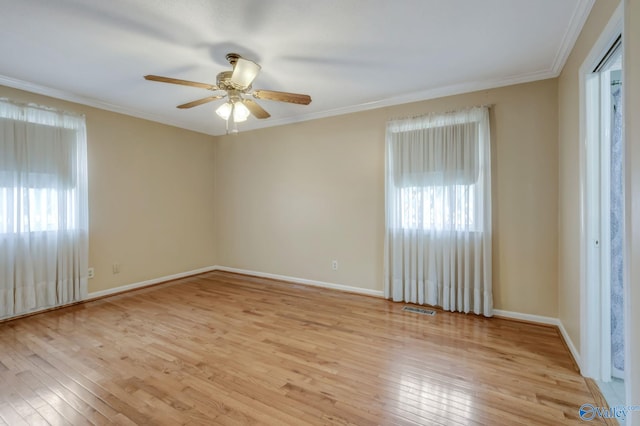 222 Lakewood Dr, Scottsboro, AL 35769 - empty room with baseboards, a ceiling fan, visible vents, and light wood-type flooring