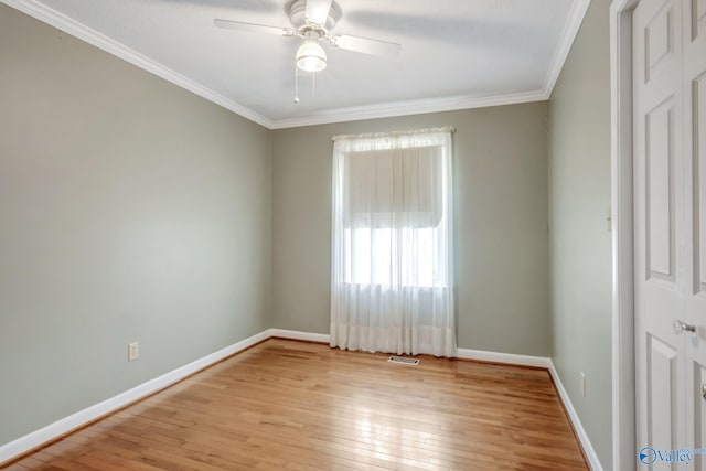 222 Lakewood Dr, Scottsboro, AL 35769 - spare room with baseboards, light wood-style flooring, ceiling fan, and ornamental molding