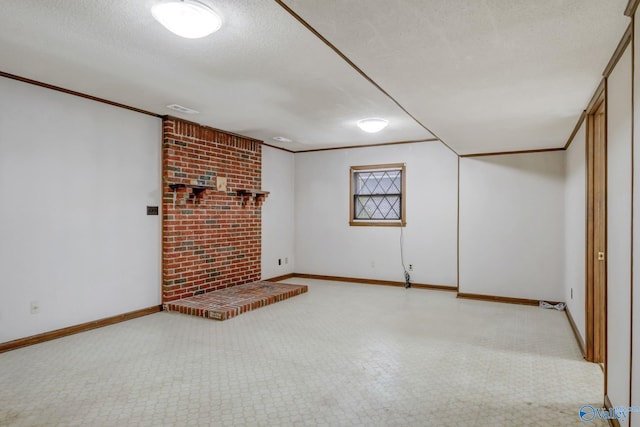 222 Lakewood Dr, Scottsboro, AL 35769 - below grade area featuring visible vents, baseboards, a textured ceiling, and ornamental molding