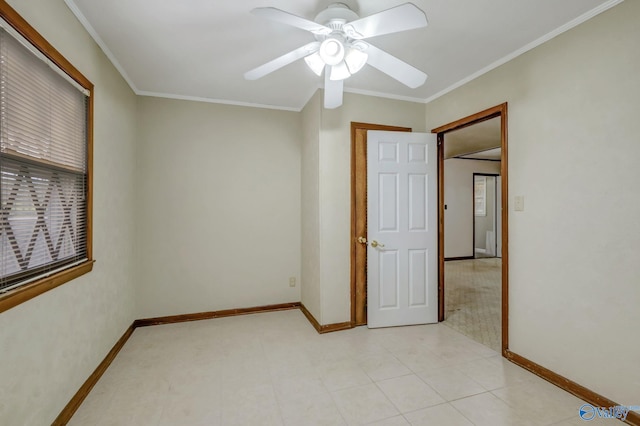 222 Lakewood Dr, Scottsboro, AL 35769 - spare room featuring ceiling fan, baseboards, and crown molding