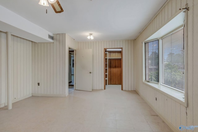 222 Lakewood Dr, Scottsboro, AL 35769 - unfurnished room with a ceiling fan and visible vents