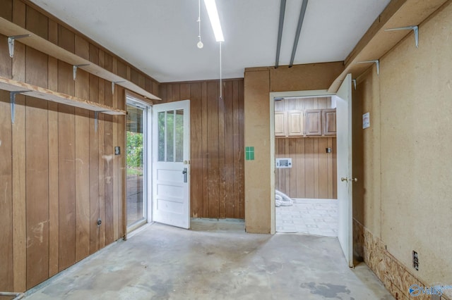 222 Lakewood Dr, Scottsboro, AL 35769 - interior space featuring wooden walls and concrete floors
