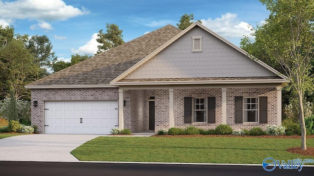 view of front of house with a garage and a front yard