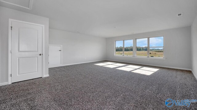 washroom with dark wood-type flooring, hookup for an electric dryer, and hookup for a washing machine