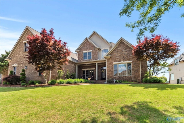 24051 Piney Creek Dr, Athens, AL 35613 - craftsman-style house with brick siding and a front yard
