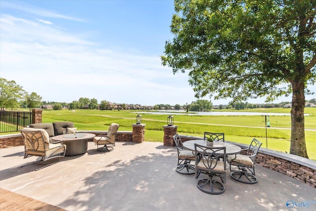 24051 Piney Creek Dr, Athens, AL 35613 - view of patio featuring outdoor dining area, a water view, a fire pit, and golf course view