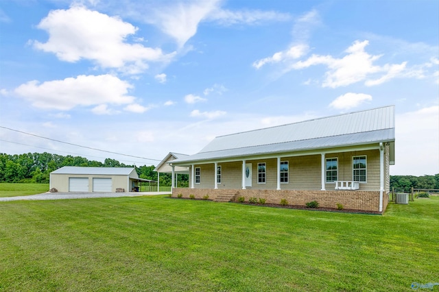 368 Halston Rd, Arab, AL 35016 - farmhouse-style home with a garage, a porch, an outbuilding, and a front yard