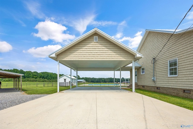 368 Halston Rd, Arab, AL 35016 - view of car parking featuring concrete driveway and a detached carport