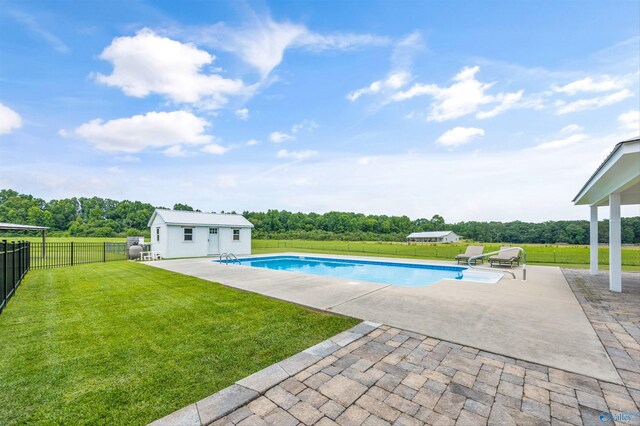 368 Halston Rd, Arab, AL 35016 - view of swimming pool with a patio, a fenced backyard, an outbuilding, and view of wooded area