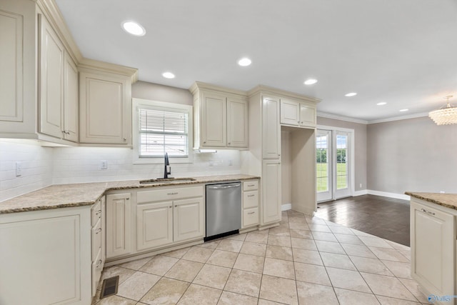 368 Halston Rd, Arab, AL 35016 - kitchen with dishwasher, tasteful backsplash, crown molding, light stone counters, and cream cabinetry