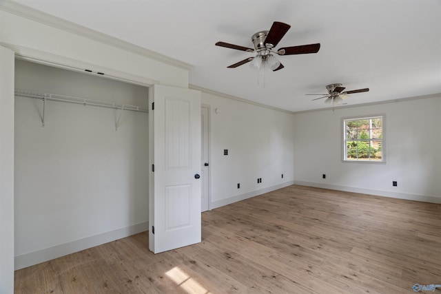 unfurnished bedroom with ceiling fan, a closet, light hardwood / wood-style flooring, and ornamental molding