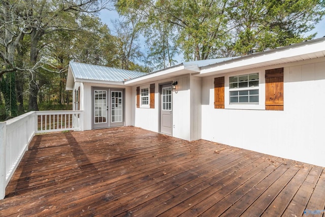 wooden deck featuring french doors