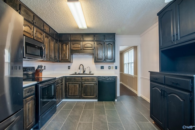 kitchen featuring black appliances, sink, a textured ceiling, dark brown cabinetry, and ornamental molding