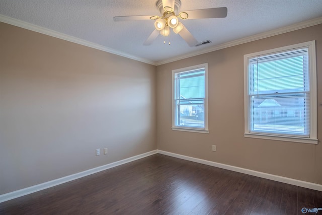 unfurnished room featuring dark wood-type flooring, crown molding, a textured ceiling, and plenty of natural light