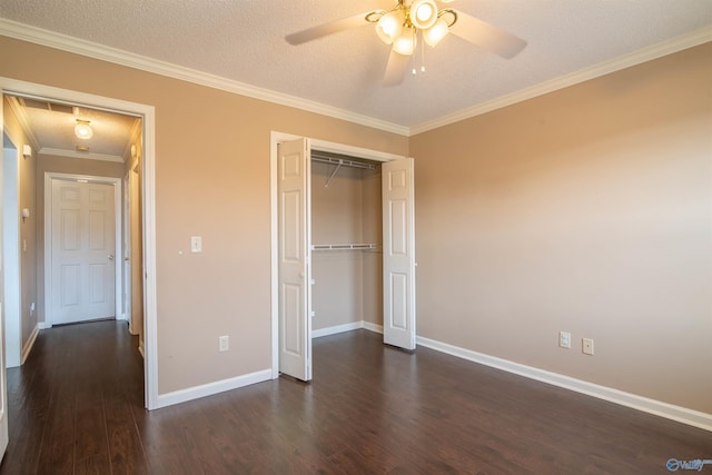 unfurnished bedroom featuring a closet, dark hardwood / wood-style floors, a textured ceiling, and ceiling fan