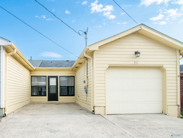 view of front of home with a garage