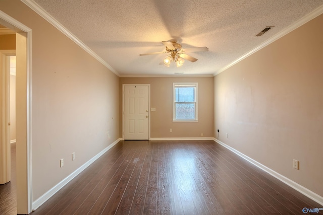 empty room featuring ornamental molding, a textured ceiling, dark hardwood / wood-style floors, and ceiling fan